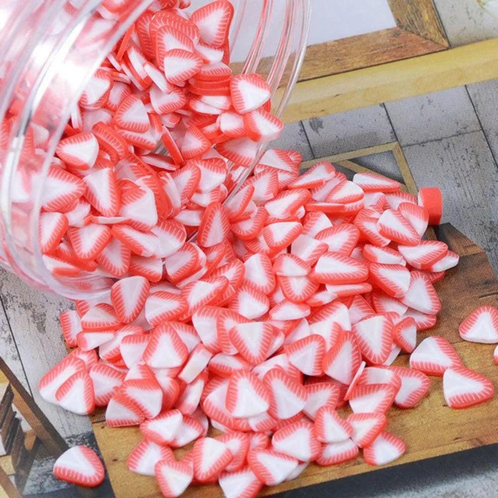 Set of 1000 polymer clay fruit slice nail art decorations, mixed designs, 5mm diameter for DIY nail art and craft projects.