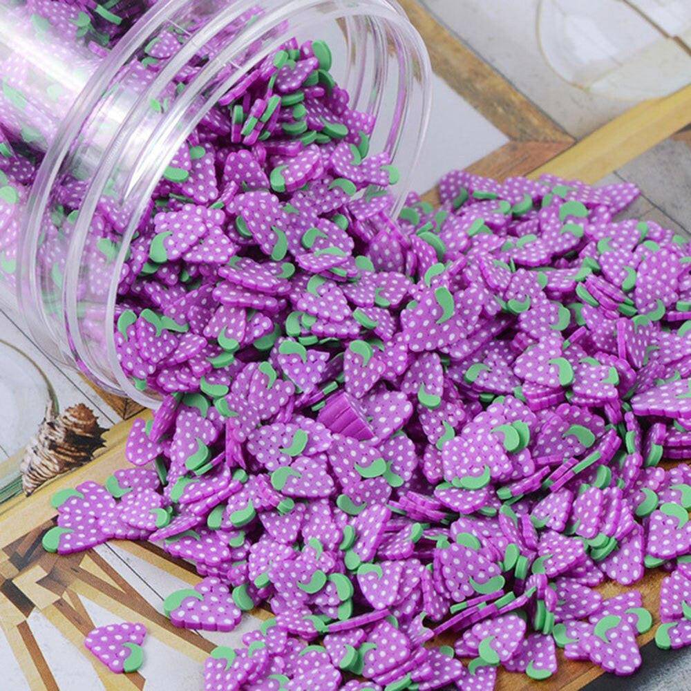 Assorted 1000pcs polymer clay fruit slices for DIY nail art, featuring mixed designs and 5mm diameter, from dev2-aff.