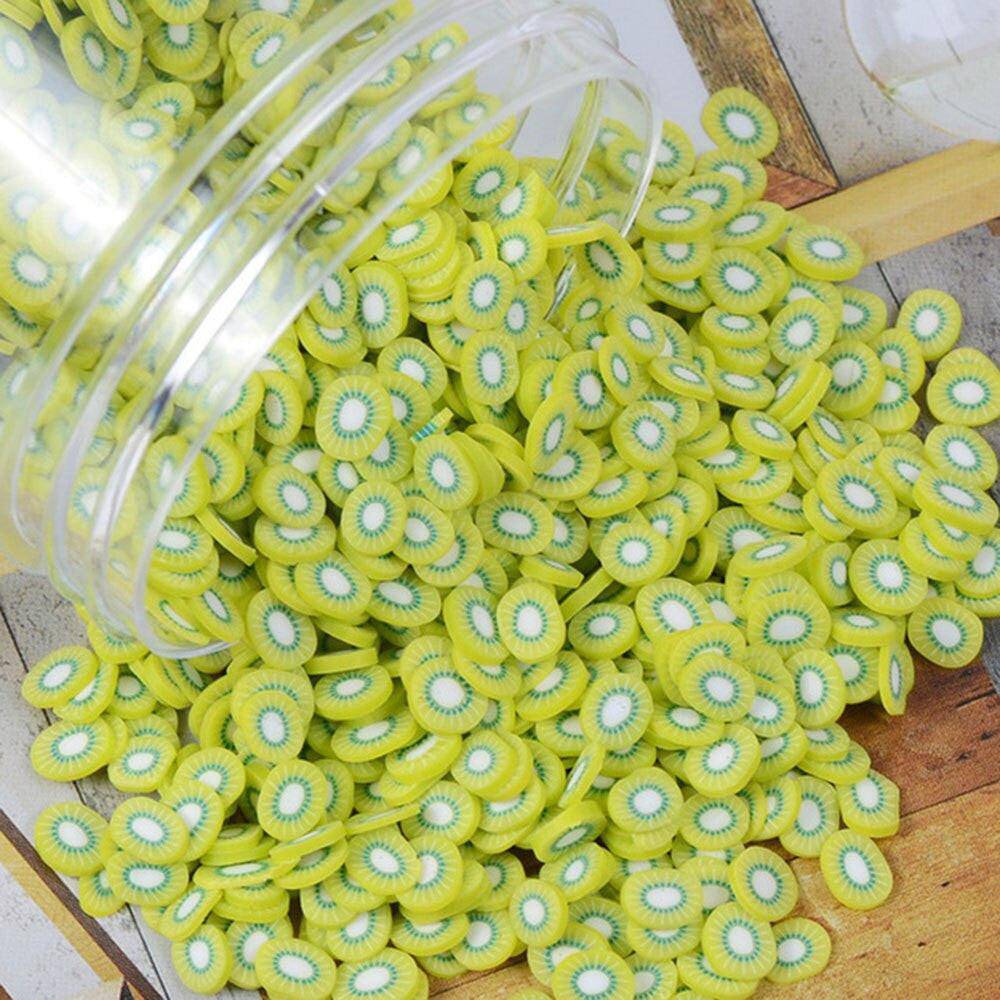 Assorted 1000pcs polymer clay fruit slices for nail art, 5mm diameter, mixed 23 design types, DIY decoration stickers.