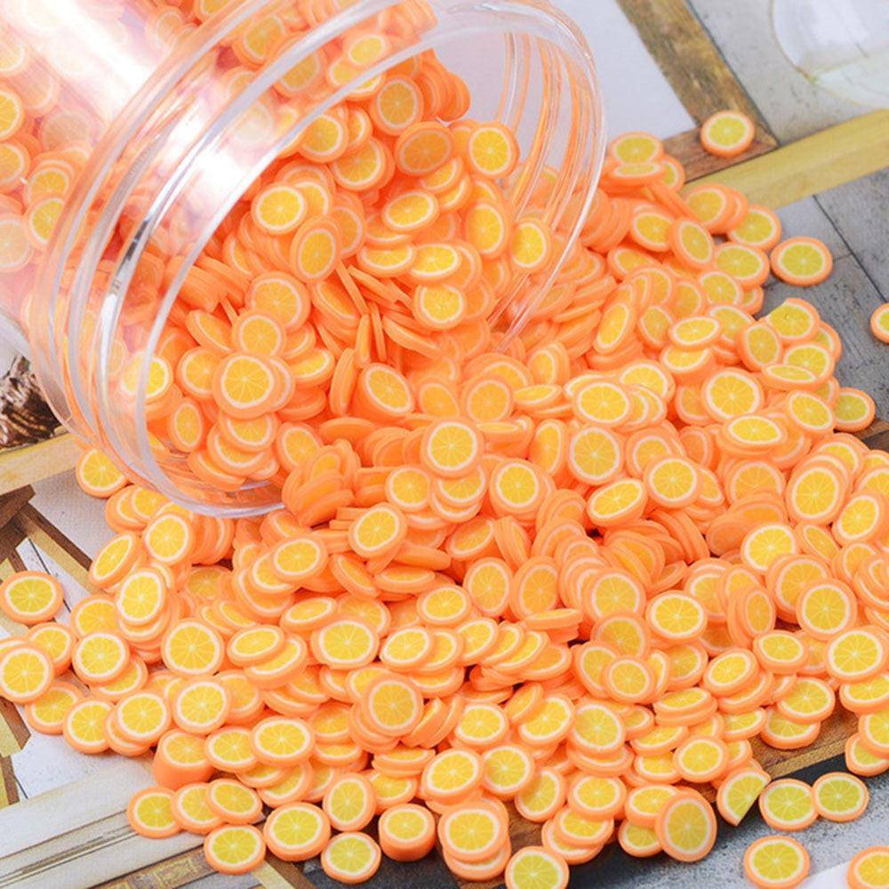 Set of 1000 polymer clay fruit slices for nail art, 5mm diameter, with 23 mixed designs for DIY nail decoration projects.