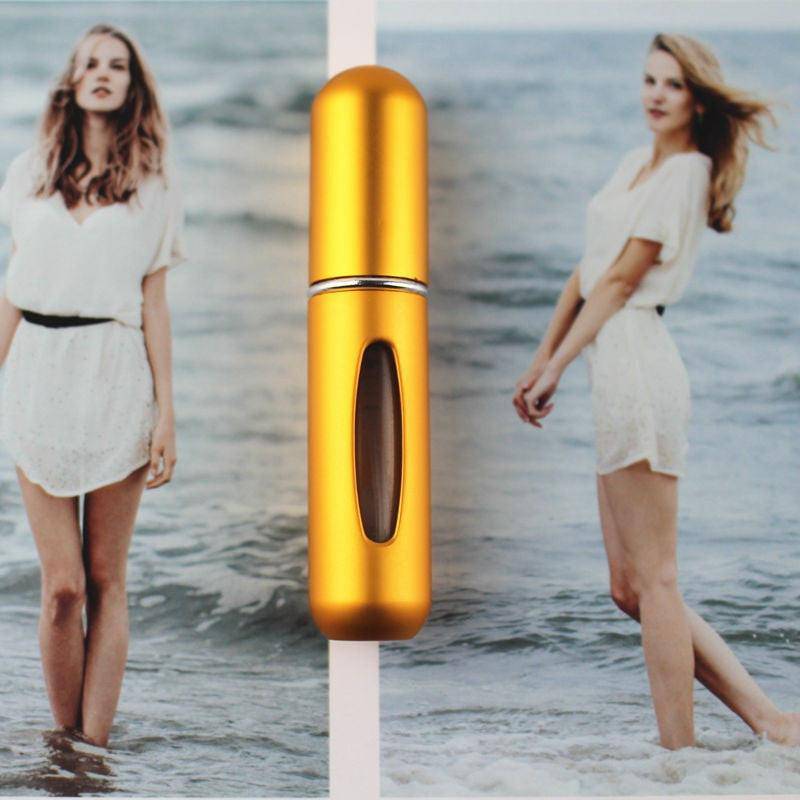 Black 5ml refillable aluminum perfume atomizer with mini metal sprayer for travel, featuring a compact, sleek design.