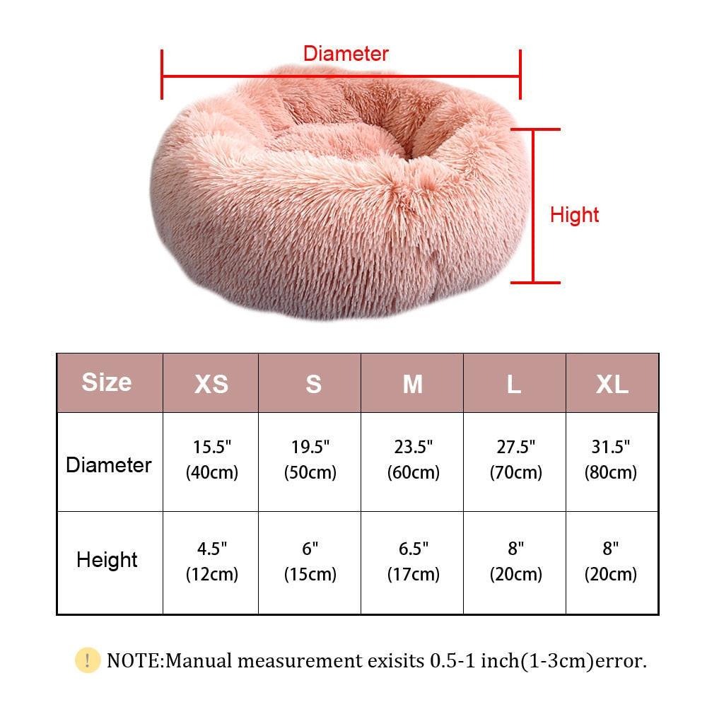 Brown fluffy calming dog bed by dev2-aff, round plush donut style orthopedic lounger for pets and puppies.