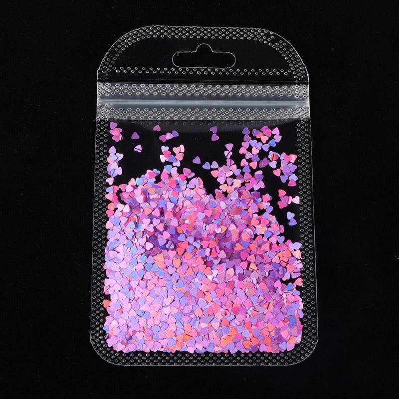 Holographic red butterfly nail art glitter sequins on a 3D laser sheet for manicure decoration and nail design accessories by dev2-aff.