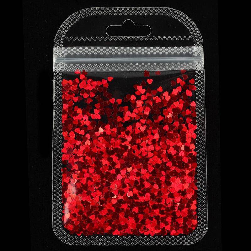 Holographic red butterfly nail art glitter sequins and 3D laser sheet manicure charms for nail design decoration.