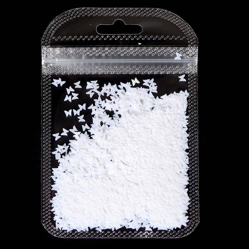 Holographic red butterfly nail art glitter sequins and 3D laser sheet for manicure decorations and nail design accessories.