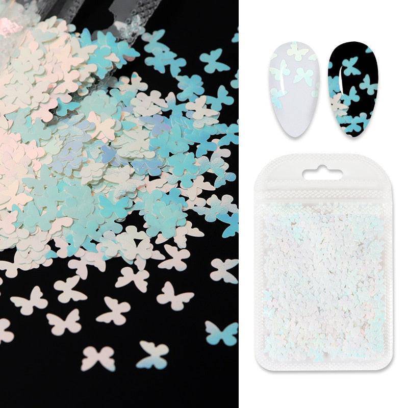 Holographic red butterfly nail art glitter sequins on 3D laser sheet for manicure decoration and nail design accessories.