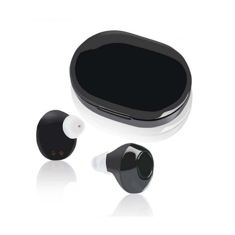 Pair of Dev2-aff USB rechargeable ITE hearing aids in skin color for elderly users, discreet and designed for hearing loss support.